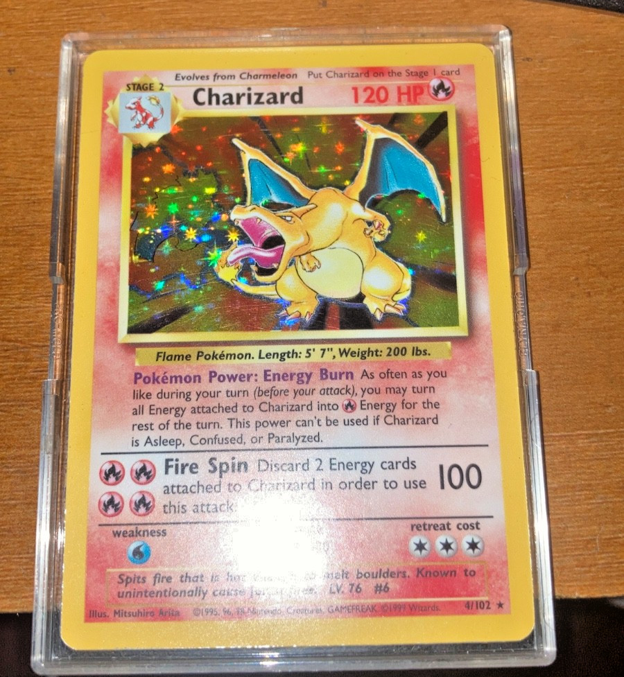 Charizard #4/102 Base Set Pokemon Trading Card (RARE HOLO GREAT CONDITION)