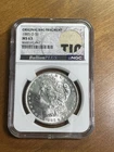 1885-O Morgan Silver Dollar NGC MS63 Bullion w/ Original Bag Fragment