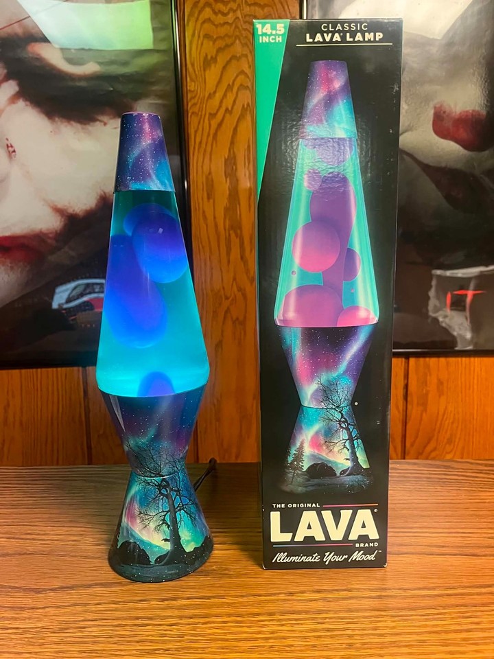 A 14.5" Northern Lights mood lava lamp with color-shifting purple lava and teal liquid — bold, atmospheric, and actually usable as room lighting.