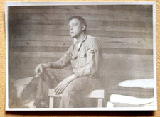 WWII Era US Soldier in Uniform Sitting on Table in Barracks Smoking Orig Photo
