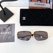 Chanel Metal frame rivet design gray lens Unisex sunglasses