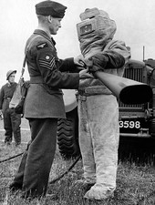 An RAF Fireman in a suit made from asbestos Historic Old Photo