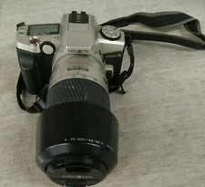 Minolta maxxum 5, 35 mm Film Camera monopod af 75-300mm lens with hood
