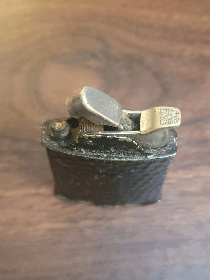 Encendedor de bolsillo con rodamiento de rodillos Evans de 1930  Foto 3 de 4