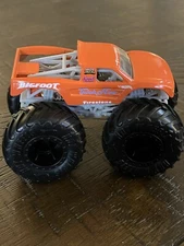 Hot Wheels Exclusive Enamel Sunkist Orange Big Foot Monster Truck 2"Tall  '2020