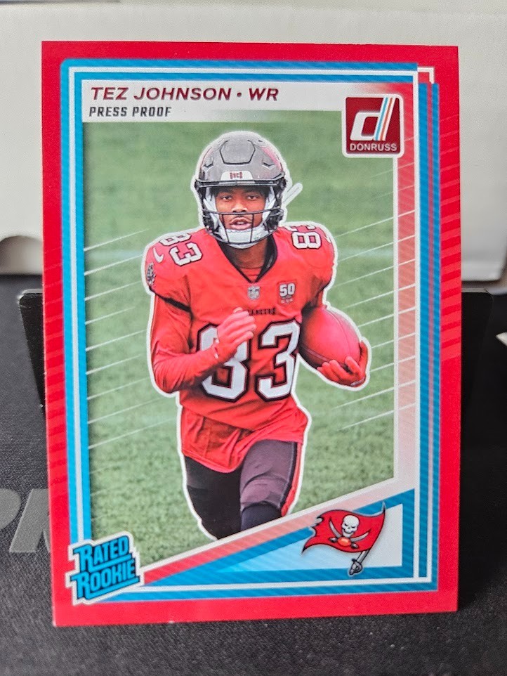 2025 Panini Donruss - Rated Rookie Tez Johnson #313 Press Proof Red (RC) Bucs