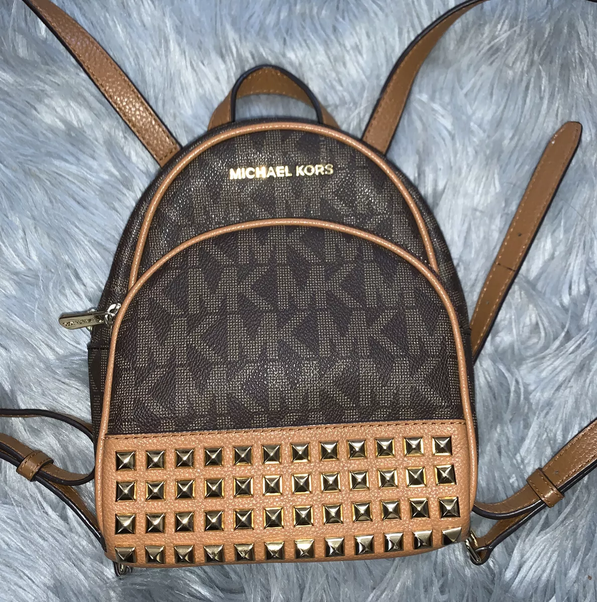Michael kors 2024 studded backpack