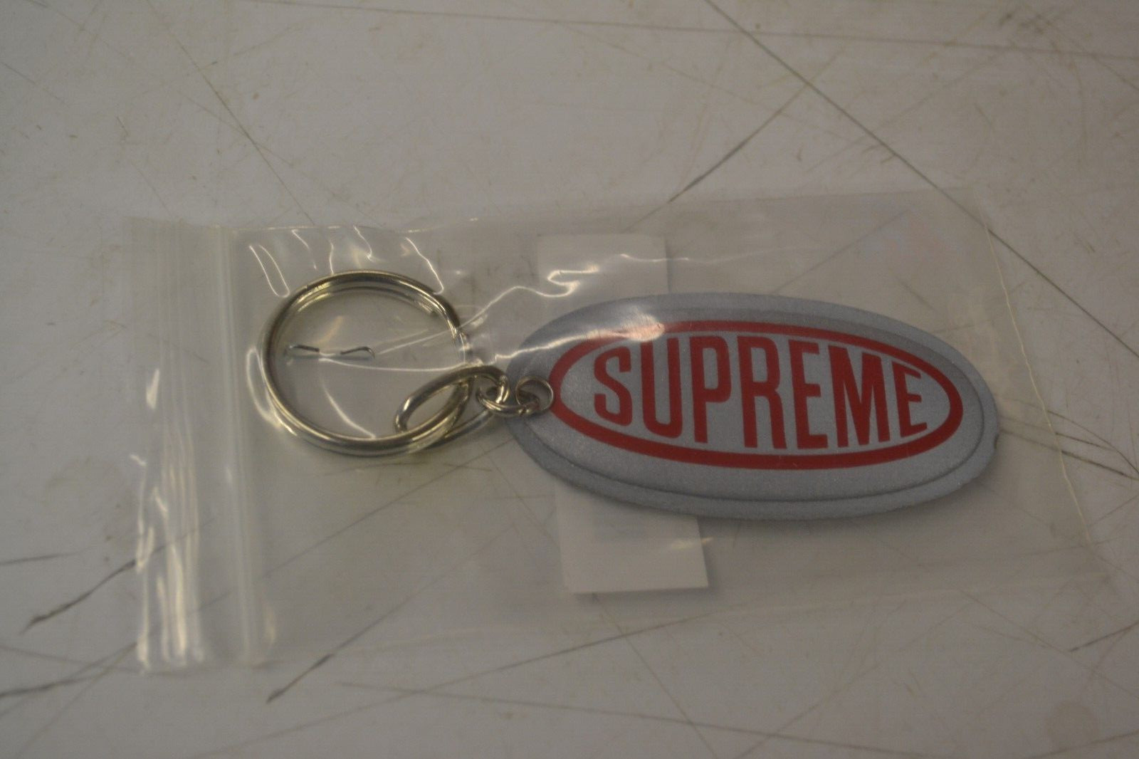 Keychain Reflective Silver Red Logo Fw18