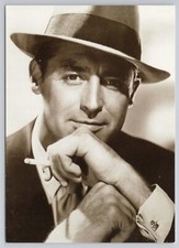 Cary Grant wearing a hat & smoking cigarette portrait - Publicity Photo Postcard