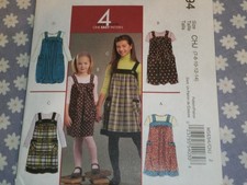 McCALL'S 5694 GIRLS EASY JUMPER DRESSES IN 4 STYLES PATTERN UNCUT-7-8-10-12-14