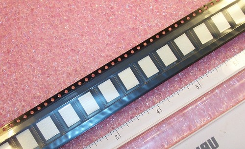 QTY (900) 2.2uf 100V 10% 4030 SMD STACKED METALLIZED FILM CF262E0225KBC AVX - Picture 2 of 4