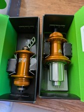Image of Hope RS4 142/12mm CL Disc Road Front & Rear Hubs Bundle Orange Shimano HG11 28h