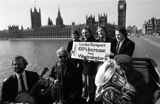 Leader Ken Livingstone rides a open top double decker bus through - Old Photo