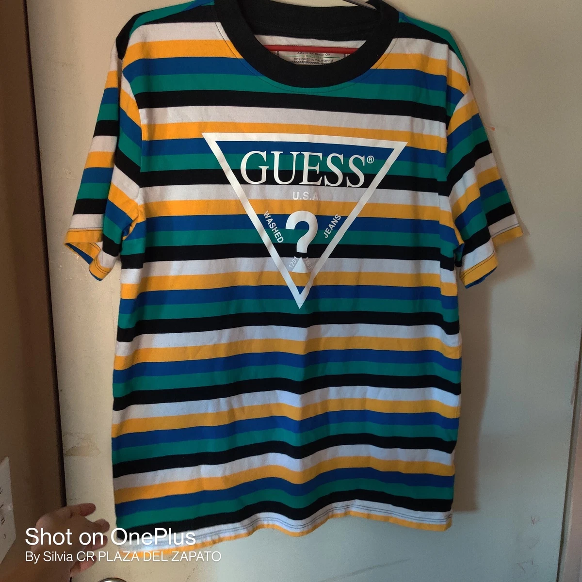 blue and yellow striped guess shirt