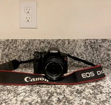 canon t2i, brand new lens, LOW shutter count
