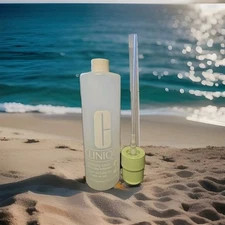 CLINIQUE-CLARIFYING LOTION BOTTLE-(EMPTY)-WITH (NEW) PUMP TOP-BOTTLE IS EMPTY!!
