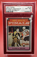 1974 TOPPS HOCKEY #215 STANLEY CUP FINALS FLYERS VS. BRUINS PSA 8