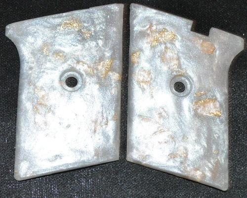 Phoenix Arms Raven 25 ACP pistol grips flip safety pearl with gold leaf plastic