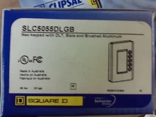 Square D Clipsal SLC5055DLGB Neo Keypad W/ DLT. Slate & Brushed Al #1B-1412-G12