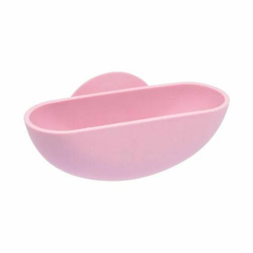 Distributeurs et porte-savons roses pour la salle de bain