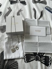 Image of Guess silver heart warming necklace brand new with box and authentication