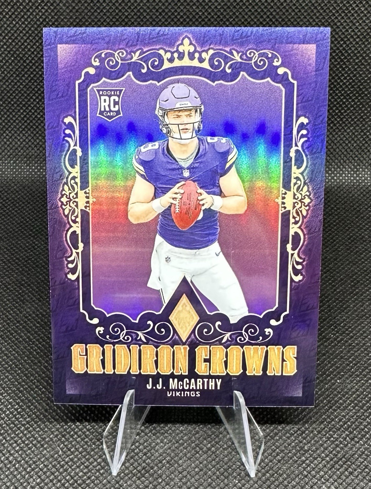 2024 Panini Phoenix - J.J. McCarthy Gridiron Crowns #GC-JMY Purple (RC)