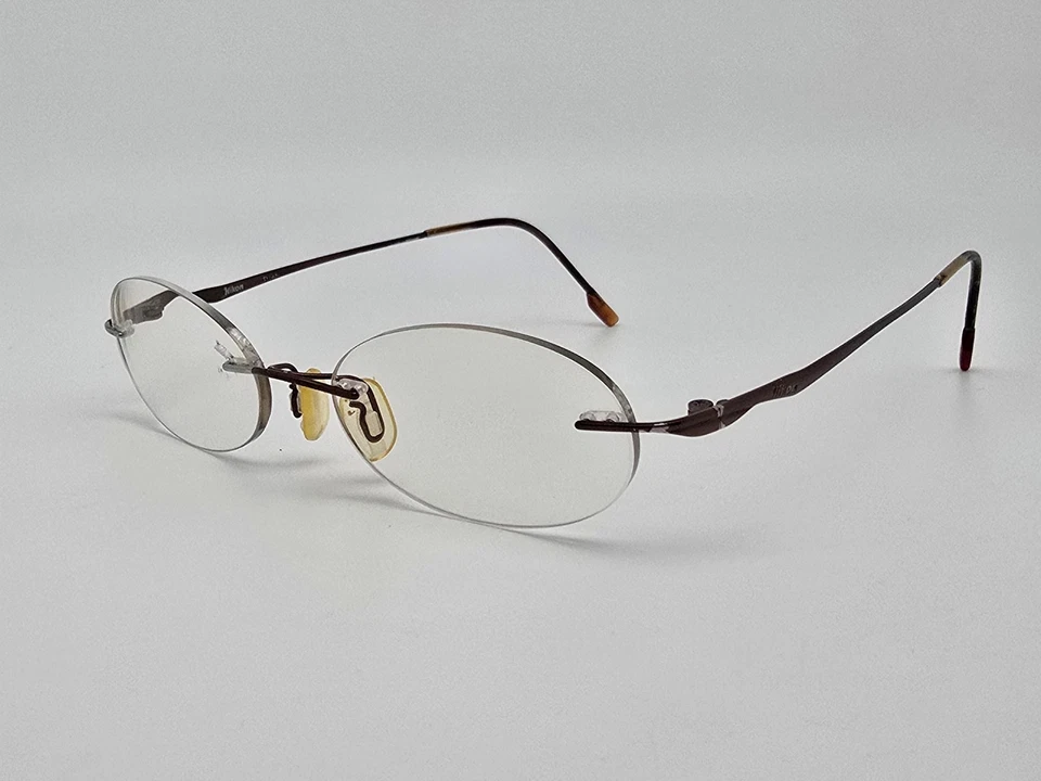 Marco de gafas Nikon 0815 marrón bronce titanio sin montura con estuche 48-17-140 Foto 3 de 4