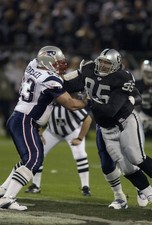 Sam Adams Oakland Raiders rushes up v Joe Andruzzi New England Pat- Old Photo 1