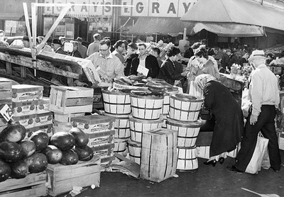 Some early crowd that showed up shop Easter flowers fruit sta- Boston Old Photo