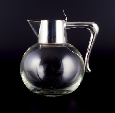 Anton Michelsen. Clear glass water carafe with sterling silver mounting.
