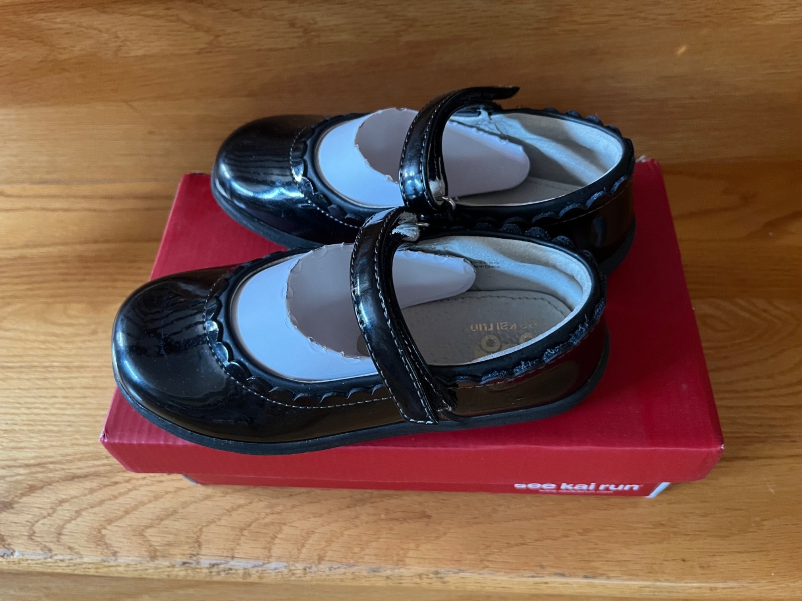 See Kai Run&reg; Jane II Black Patent size 13.5 EU31