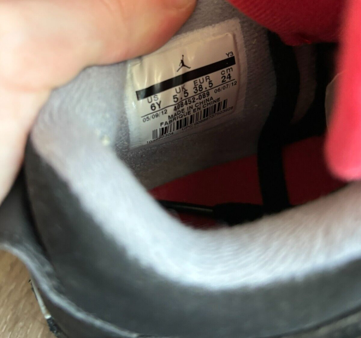 jordan 4 bred tag