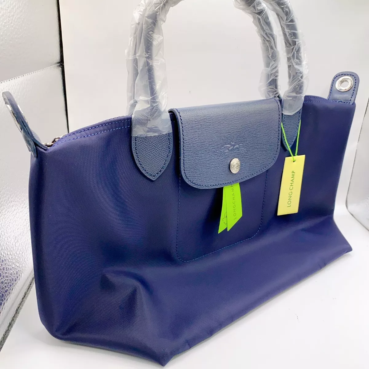 longchamp le pliage neo small vs medium