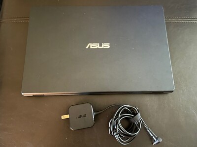ASUS laptop / Chrome book E410M  With Power Supply READ