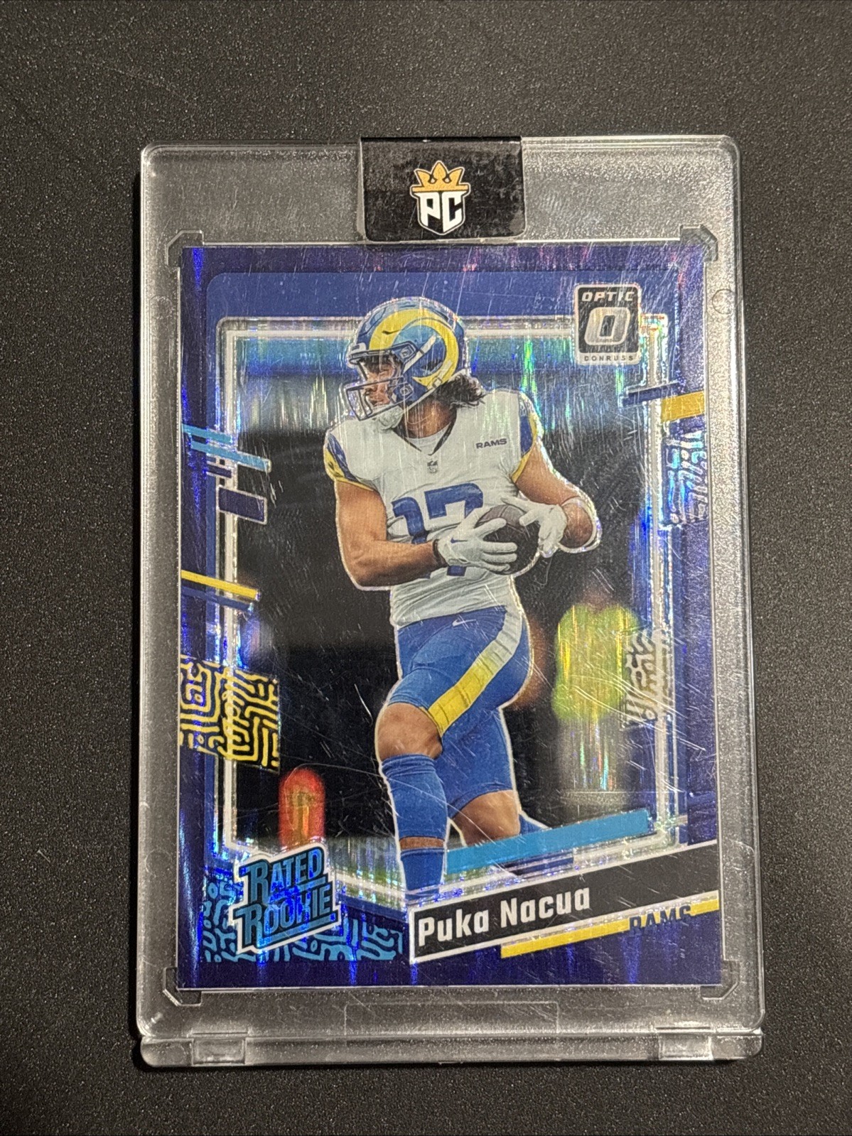 2023 Panini Donruss Optic - Rated Rookie Puka Nacua #238 Purple Shock Prizm (RC)