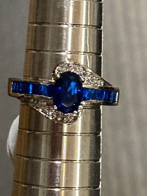 Beautiful blue glass crystal and clear crystal stone ring. Silver tone 