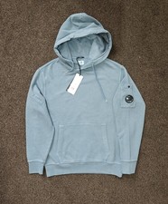 Image of BRAND NEW C.P.. COMPANY BABY BLUE Resisted dye LENS HOODIE SIZE SMALL