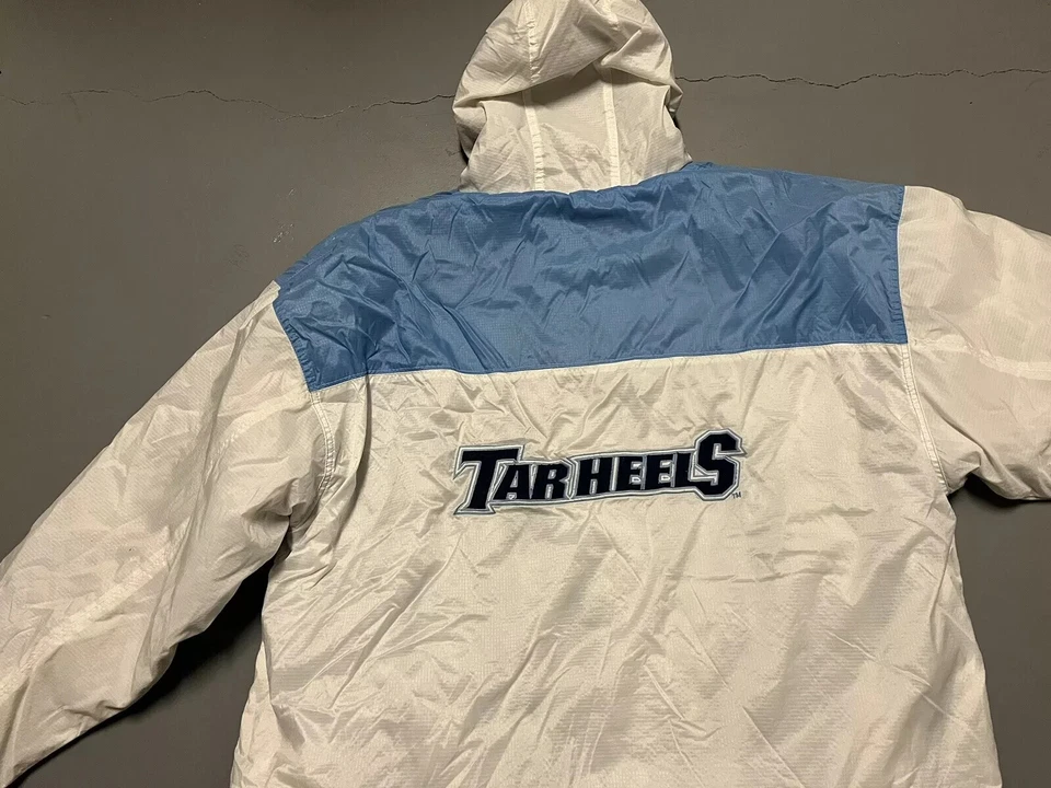 Chaqueta acolchada North Carolina Tar Heels Reebok azul y blanca NCAA manga larga Foto 2 de 4