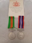 British WW2 medals, 1939-45 Defence Medal and War Medal with original ribbons