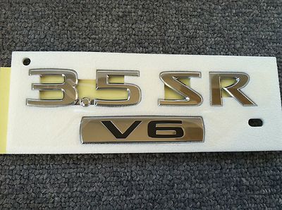 Nissan Altima SR 3.5 V6 decklid trunk chrome nameplates appliques