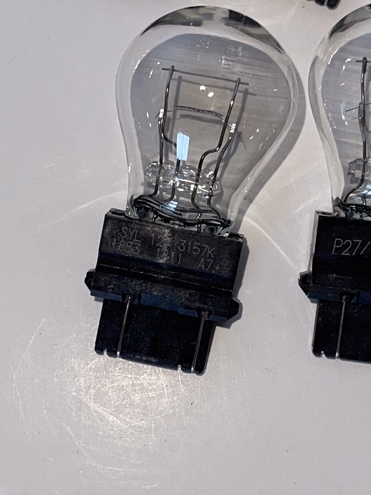 SYLVANIA 3157 P27/7W Automotive Light Bulbs OEM 12V Dual Filament 4-Pack