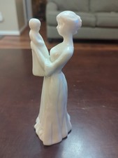 Mom Holding Baby Figurine