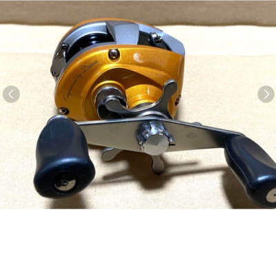 DAIWA Liberto Pixy Orange Amber Baitcast Reel Very Good Condition