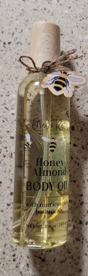 ACEITE CORPORAL DE ALMENDRAS MIEL RAÍCES DE HIERBA CON INGREDIENTES BOTÁNICOS RICOS 8.FL OZ NUEVO Foto 2 de 4