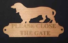 Bespoke wood dachshund dog sign saying 'Please close the gate' underneath  door