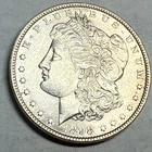 1898 Morgan silver dollar. Satiny white choice BU $1. #le1