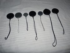 Lot of 7 Canon Lens cap caps for cameras and camcorders 12 