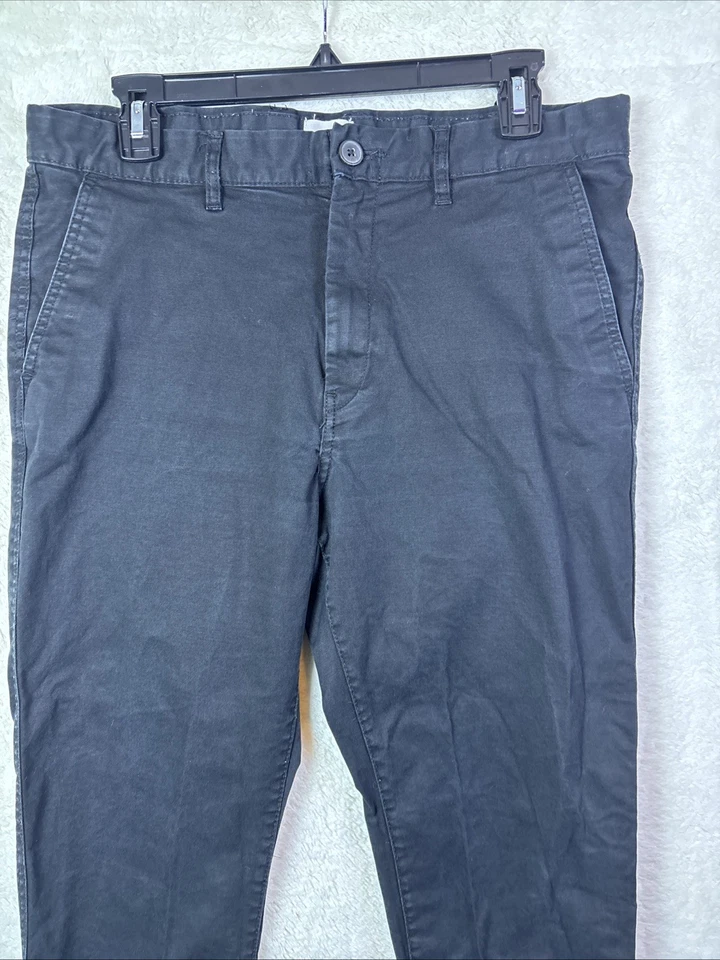 Pantalones negros elásticos ajustados talla 33 de H&M Foto 4 de 4