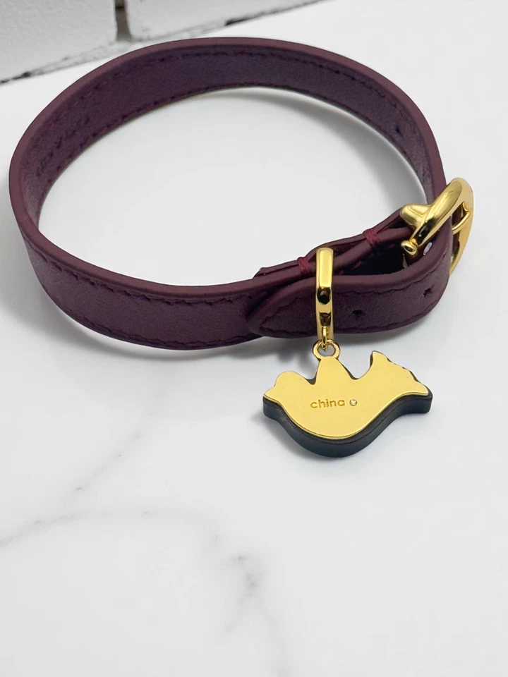 Pulsera Coach Charm Pájaro Dorado Burdeos Sangre de Buey Borgoña Cuero Hebilla Correa Foto 3 de 3