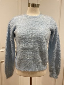 light blue fuzzy sweater
